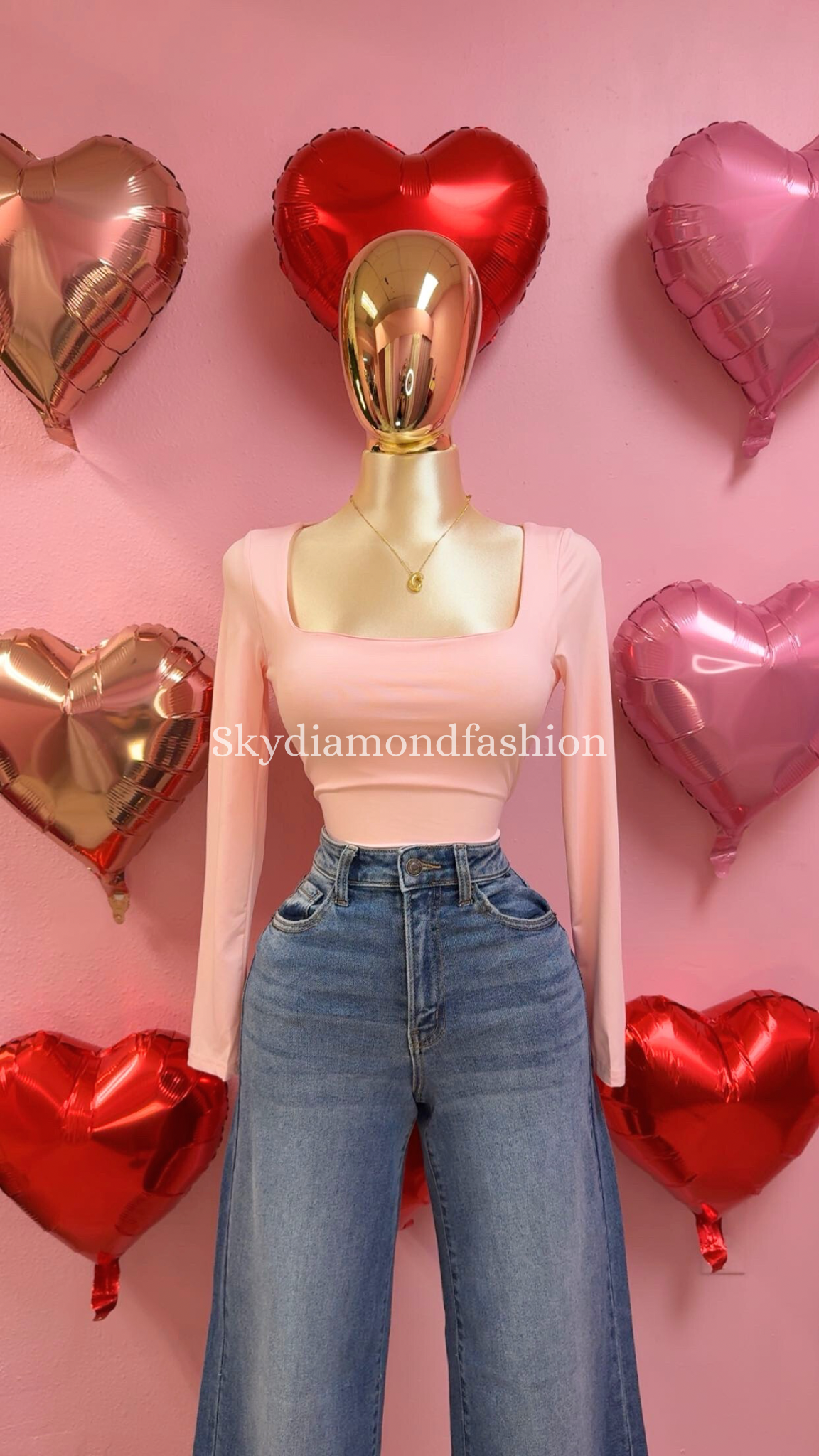 Baby pink long sleeve bodysuit
