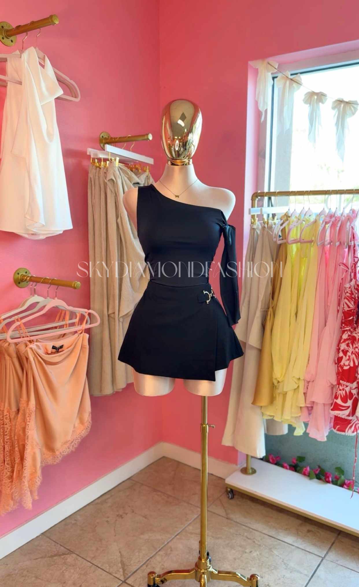 Black skort (gold hardware)